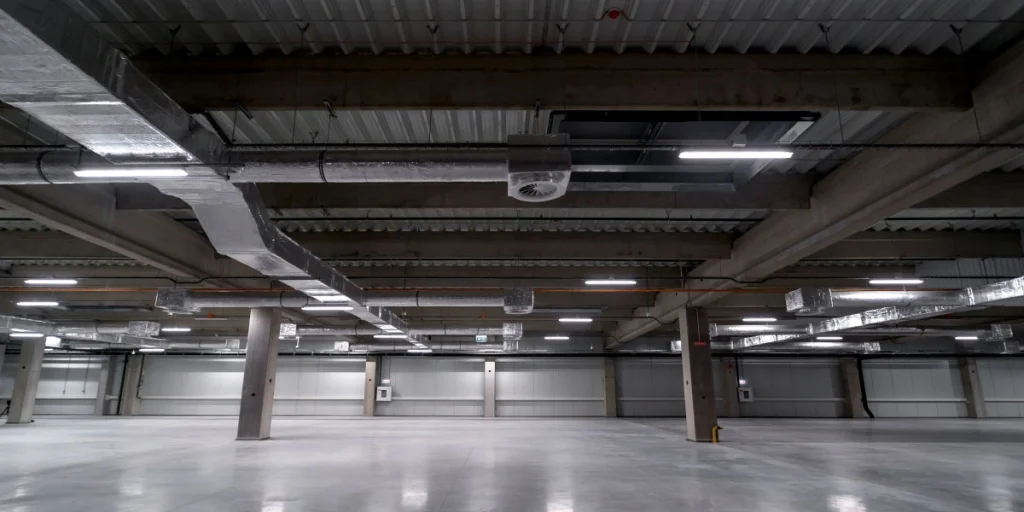 พื้นโรงจอดรถแบบคอนกรีตขัดมัน